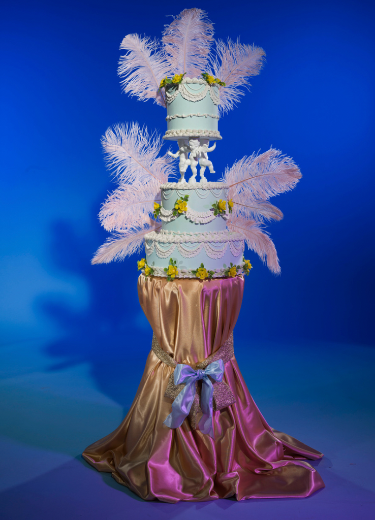 Three Layer Wedding Cake in Blue and White is a sculpture featured in Amanda Rowan’s irresistibly lush Place Setting series; An immersion into the exquisite tactility of housekeeping finds expression and rebellion in these multimedia performance pieces of photography, film, and sculpture. 