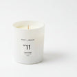 White soy wax candle in a white glass jar from the Atmosphere collection by Poet and the Bench