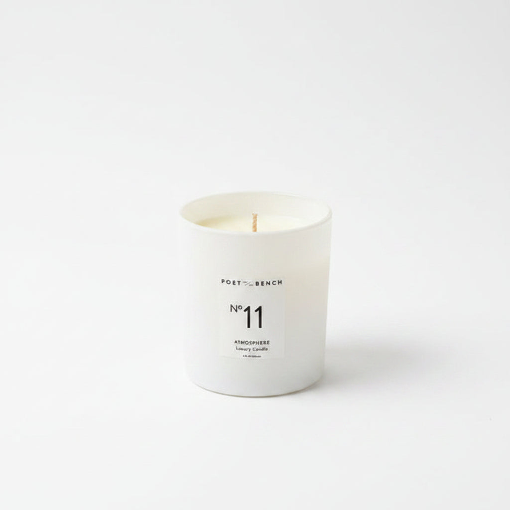 White soy wax candle in a white glass jar from the Atmosphere collection by Poet and the Bench