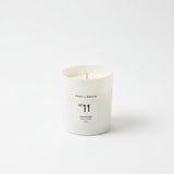 White soy wax candle in a white glass jar from the Atmosphere collection by Poet and the Bench
