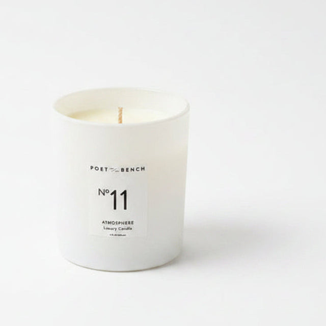 White soy wax candle in a white glass jar from the Atmosphere collection by Poet and the Bench