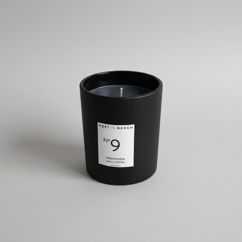 Black No 9 Candle with sensual, warm and spicy notes of black pepper, rose geranium and clove