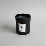 Black No 9 Candle with sensual, warm and spicy notes of black pepper, rose geranium and clove