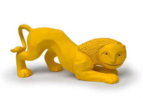 Austyn Taylor's ceramic yellow crouching lion is inspired by ancient art but feels totally modern. Named History, he evokes a curious humor as a salve to the oft absurd and alienating experience of existing.