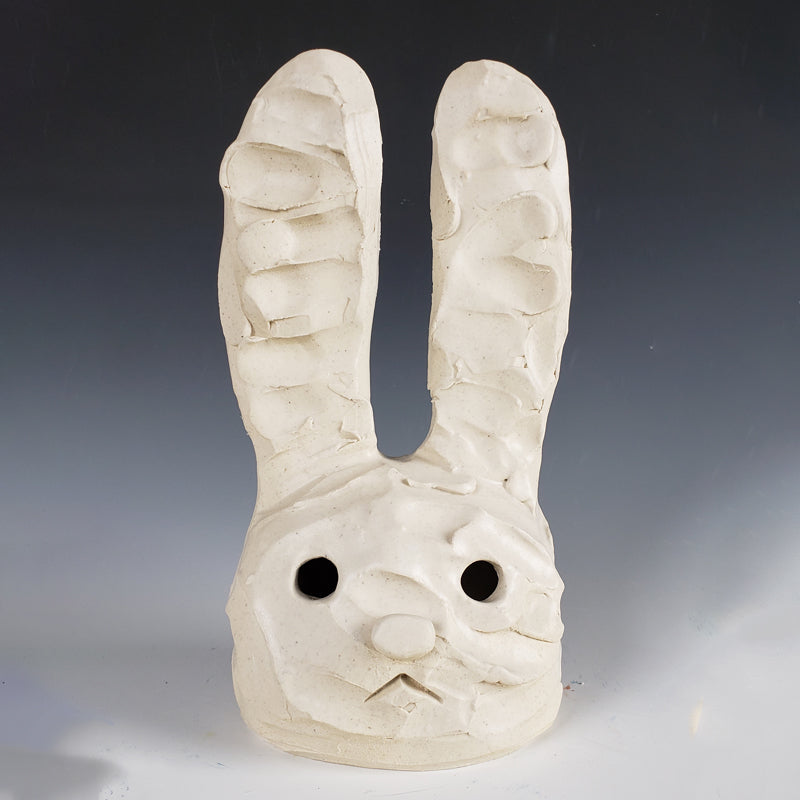 One of a kind white bunny head ceramic sculpture and part of a limited edition. By artist Austyn Taylor.