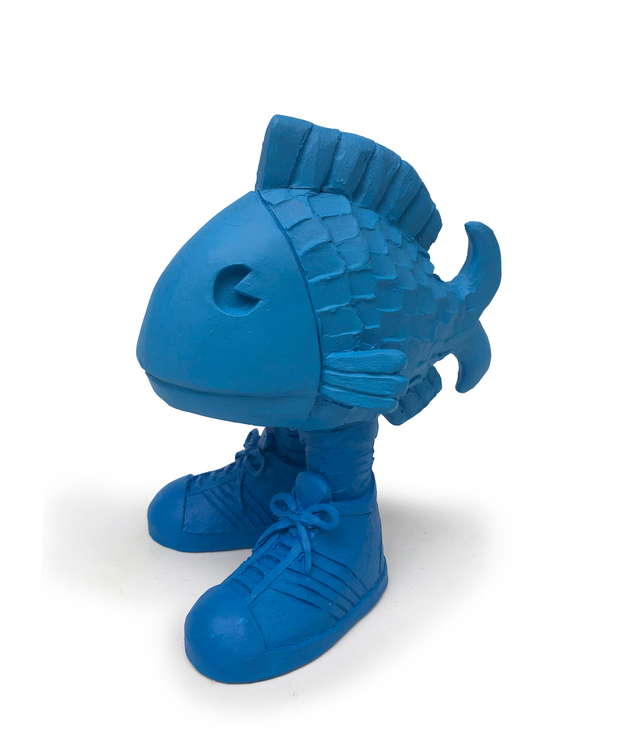 Austyn's ceramic blue fish wearing sneakers is named Fredrick. He evokes a curious humor as a salve to the oft absurd and alienating experience of existing. Bring him home as part of your family!