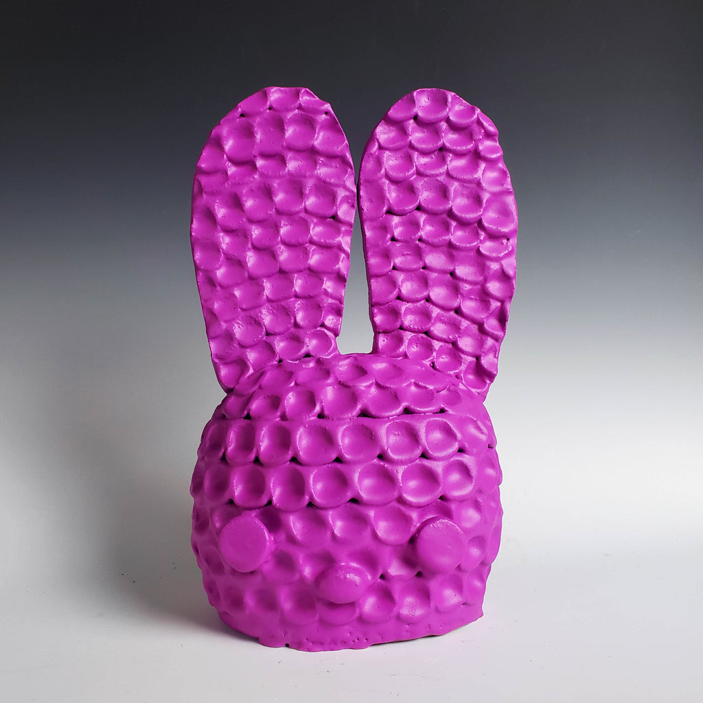 A textured bright pink rabbit head by Austyn Taylor that looks utterly squeezable! But it's clay! Grelim exudes a fresh burst of personality