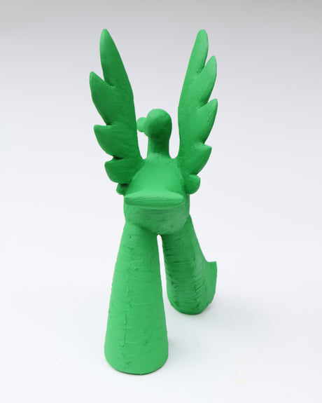 Back view of hand built ceramic duck sculpture in the style of pop folk art