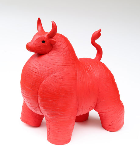 Red bull ceramic sculpture on a white background