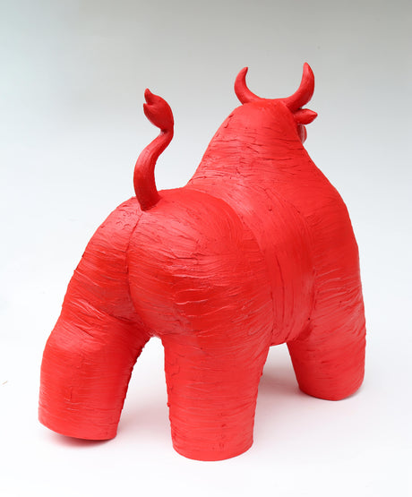 Red bull sculpture on a white background