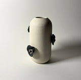 Narrow Petals and Claws Vase. With intricate attached flowers and claw thorns. 