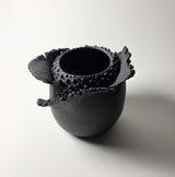 Peeling Petals Vase in black clay inspired by the resilient plants of the desert, their forms and textures