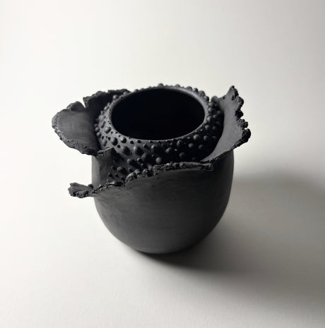 Peeling Petals Vase in black clay inspired by the resilient plants of the desert, their forms and textures