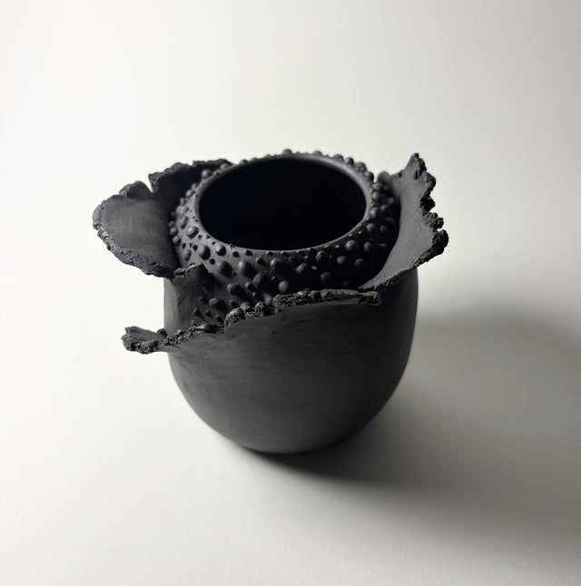 Peeling Petals Vase in black clay inspired by the resilient plants of the desert, their forms and textures