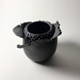Peeling Petals Vase in black clay inspired by the resilient plants of the desert, their forms and textures