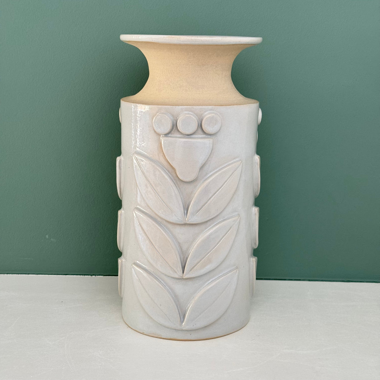 Julems Ceramics gorgeous wheel thrown vases are a technical feat with hand carved relief designs.