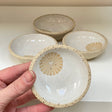 A charming small ceramic dish decorated in radial lines pattern to serve salt, pepper and chopped herbs, a dipping or soy sauce, nuts, olive pits... or to hold your favorite trinkets (rings and things) on your bedside table.