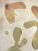 Detail of abstract art by Danielle Hutchens using natural pigments with earthy, green, and orange shapes on a light background
