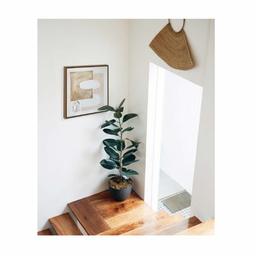 This Way by Danielle Hutchens shown hanging in a house with a plant.