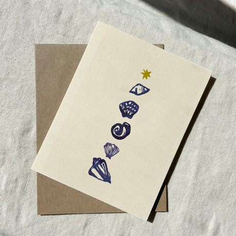 Greeting card with sea shell illustrations