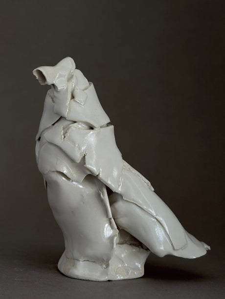 White ceramic porcelain sculpture of a bird 