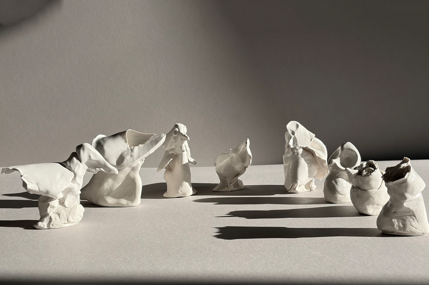 Group of white ceramic porcelain bird figures by David Duncan Livingston