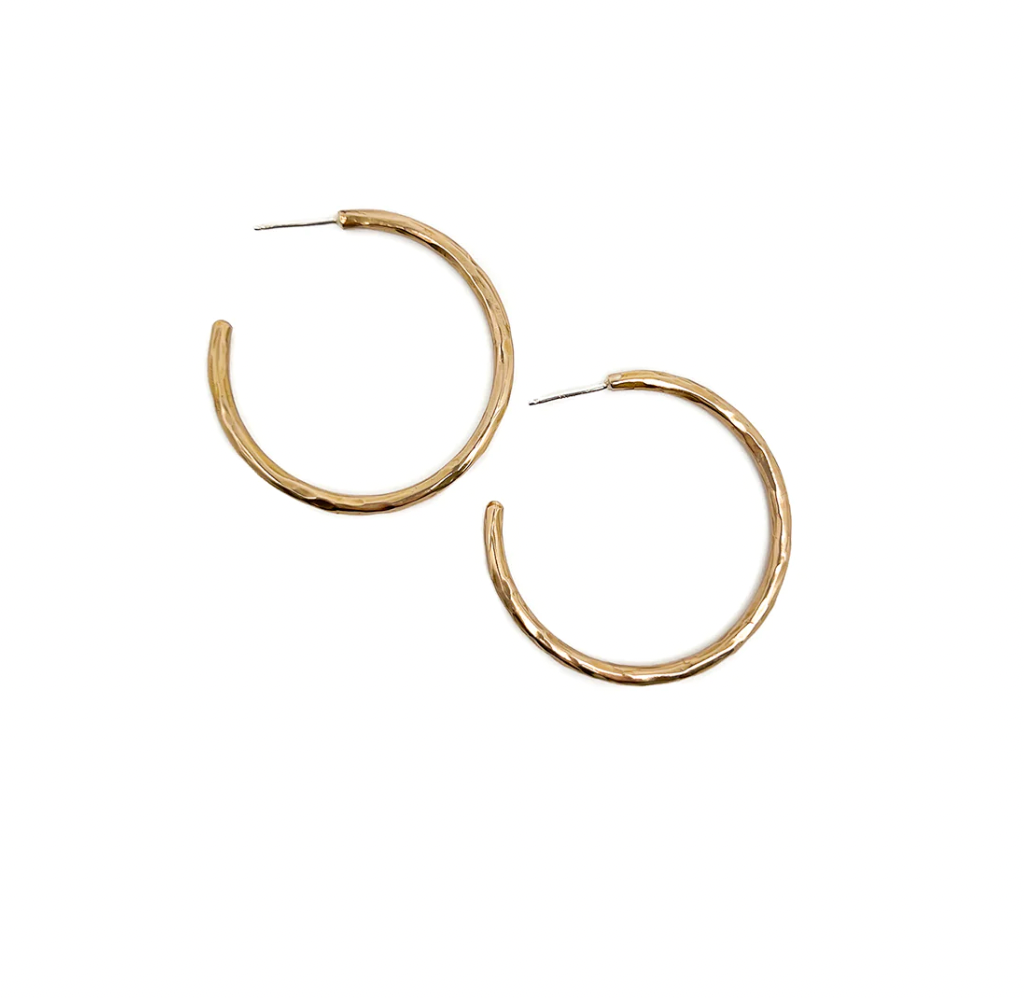 Classic hoops are hand formed and cast in bronze or silver. Lightweight but strong on statement!