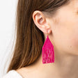 Lexie Woven and Beaded Earrings in a Solid Color Way of Hot Pink for a fresh pop of color, shown on model