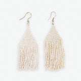 A subtle luminous shimmer, these lightweight and effortlessly cool woven beaded fringe earrings in ivory will be your everyday staple! 