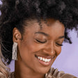 We absolutely love the glamour of these lightweight and effortlessly cool woven beaded fringe earrings with their luminous shimmer. These sparkly silver beauties evoke the playfulness of Marilyn Monroe! Shown on model!