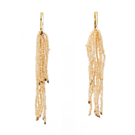 4" long cascading seed bead chandelier fringe earrings combine a golden seed bead with hammered brass details. 
