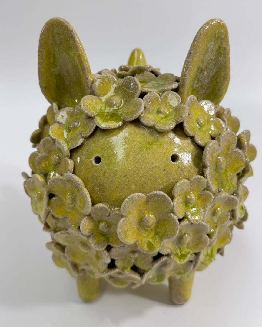 Standing Blossoming Sculpture of an animal, could be a cat, a dog, a rabbit or from your imagination.