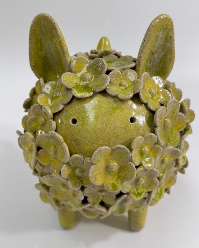 Standing Blossoming Sculpture of an animal, could be a cat, a dog, a rabbit or from your imagination.