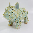 This is Honey Dew, a standing ceramic Frenchie dog sculpture in iridescent light mint green glaze.