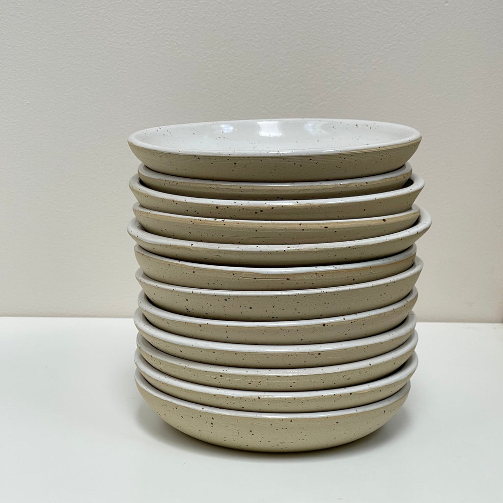 Stack of Julems Ceramics saucers for 4.5" planters, included in price.