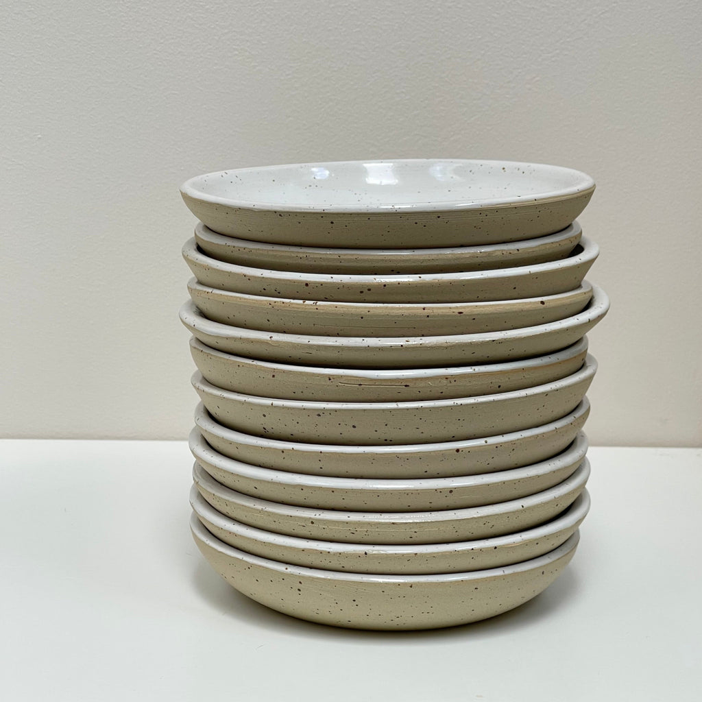 Stack of Julems Ceramics saucers for 4.5" planters, included in price.
