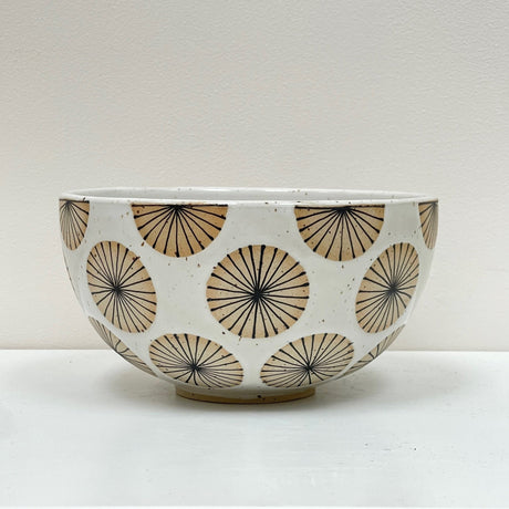 Pasta, quinoa, a layered green salad or beet salad. Start a new ritual with this perfectly sized medium bowl design decorated with radial circles.&nbsp;