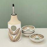 Olive Oil Pour and small dishes for salt and pepper, olive pits, chopped herbs or your trinkets, like jewelry and things. By Julems Ceramics. 