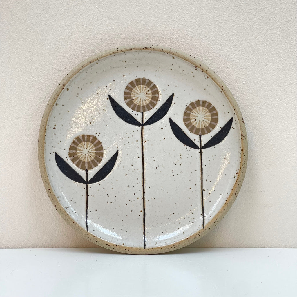 Scandinavian influenced folk art designs make this wall hanging plate a beautiful edition to your gallery wall! We love the 3 olive flowers aesthetic by Julems Ceramics