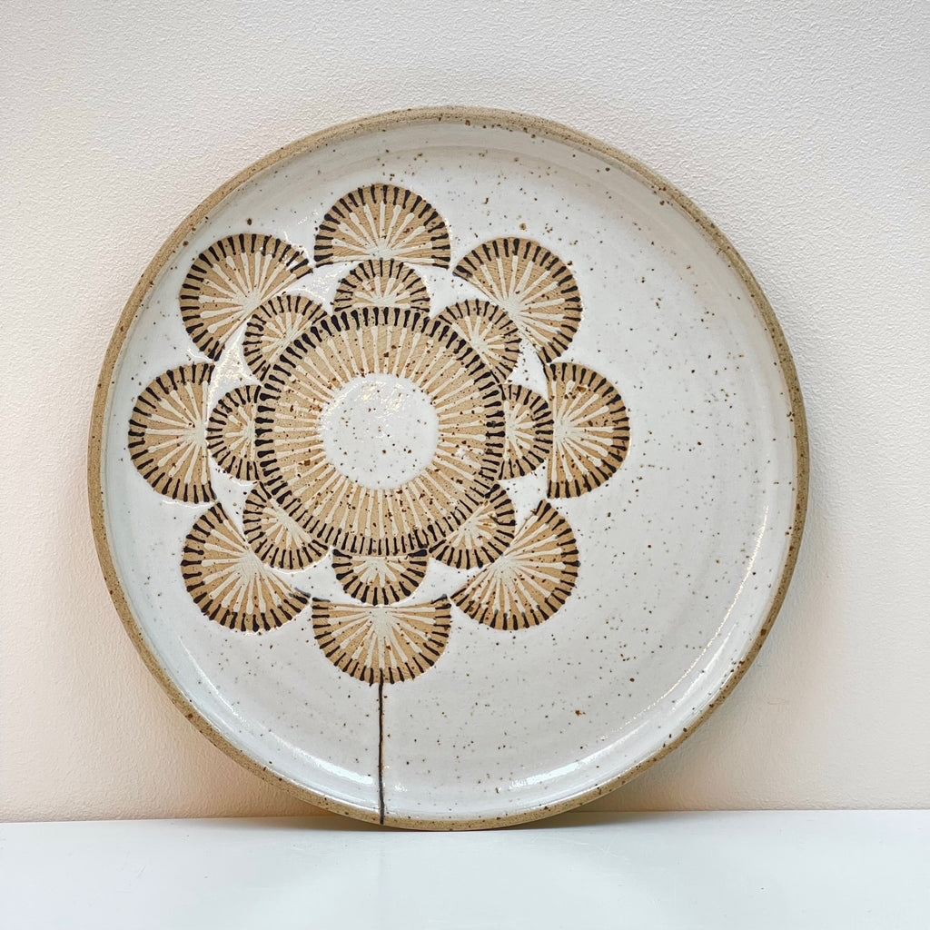 Ceramic wall hanging plate is a beautiful edition to your gallery wall! We love the double radial flower aesthetic by Julems Ceramics