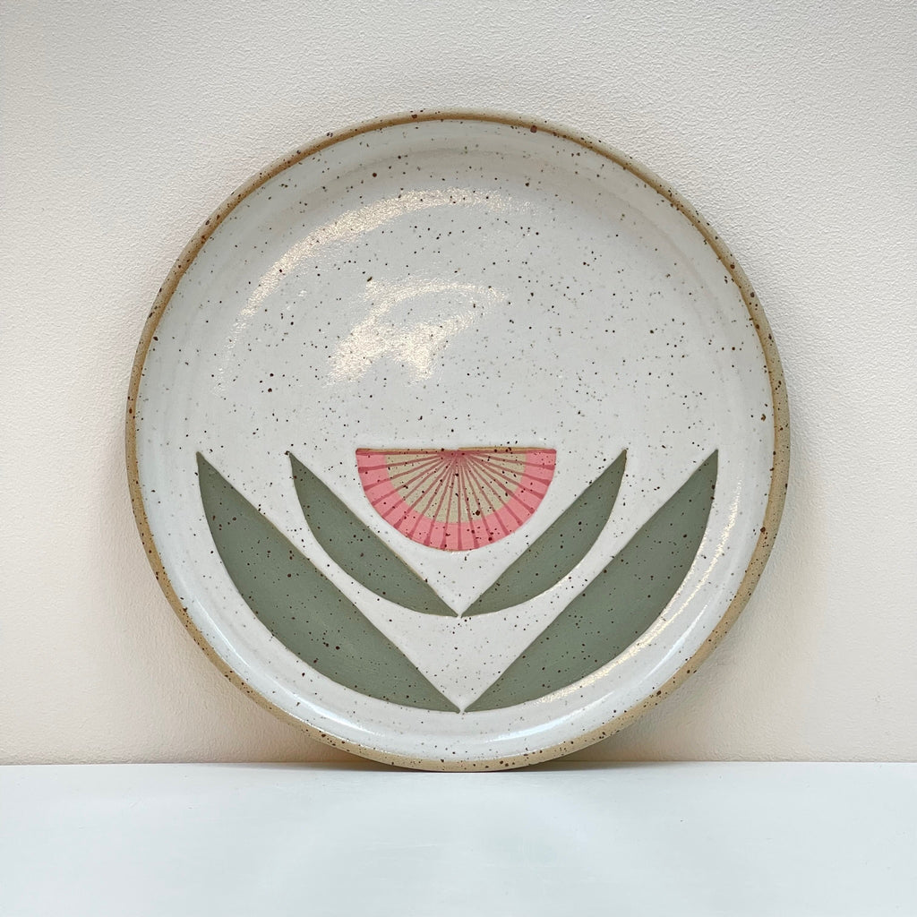 Wall Hanging Plate with Scandinavian influenced folk art designs make this a beautiful edition to your gallery wall! We love the light pink flower geometric aesthetic by Julems Ceramics