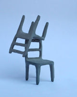 Small ceramic blue chair sculptures