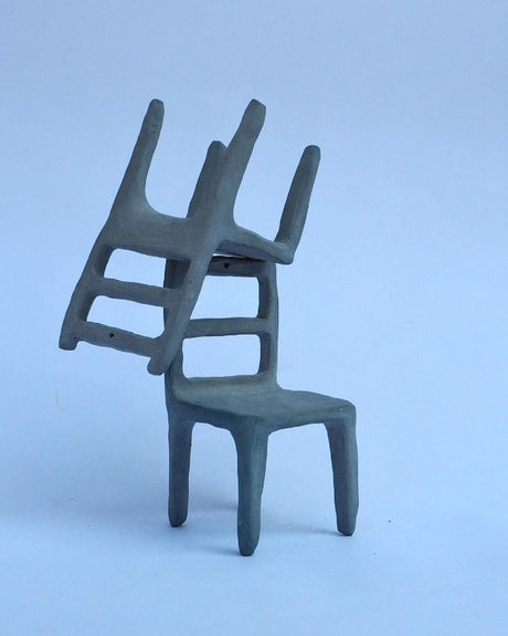 Small ceramic blue chair sculptures
