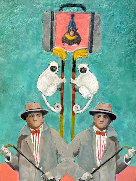 Two men in suits with bow ties stand next to a suitcase with a monkey painted on the outside, on a teal background.