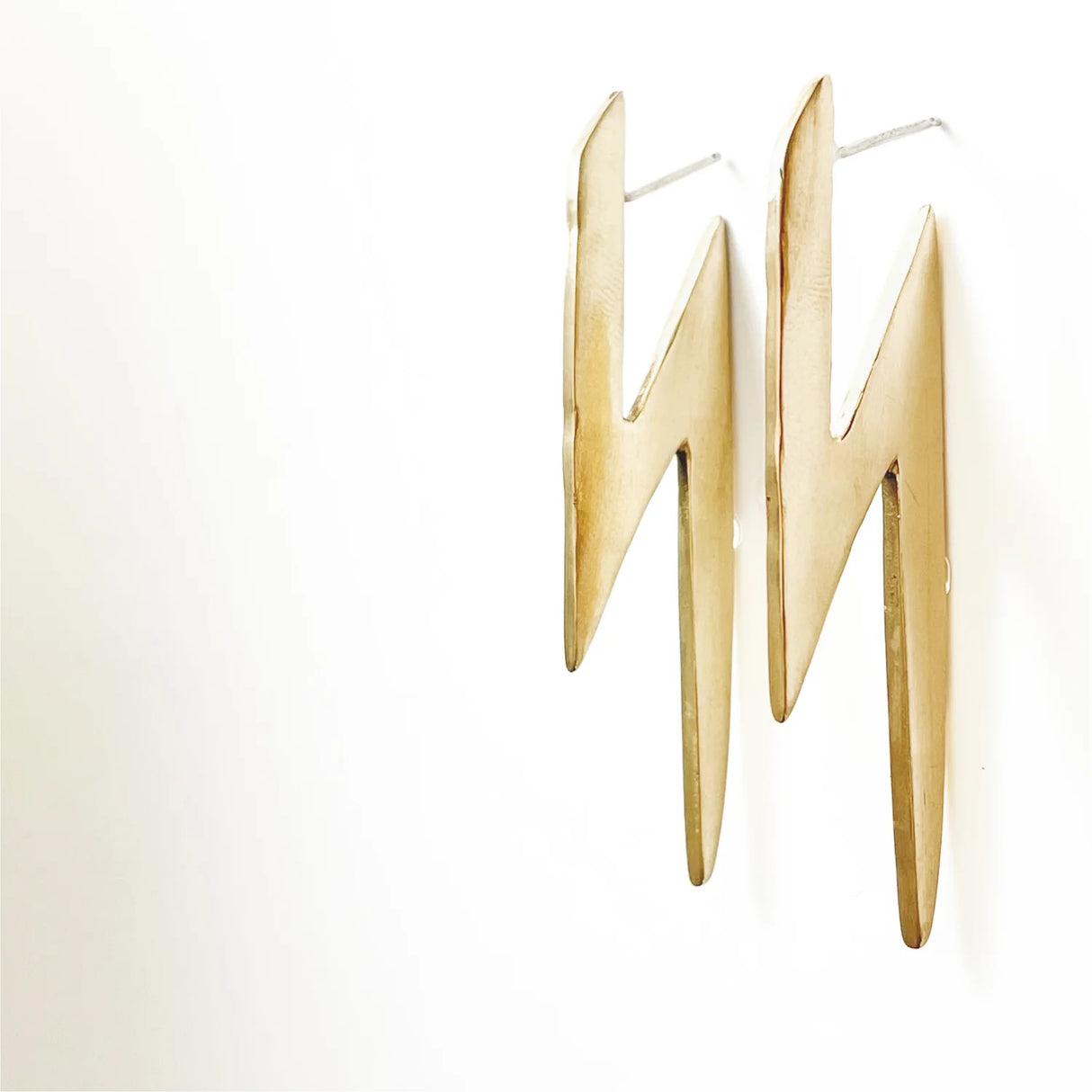 David Bowie inspired lightening rod earrings in bronze or silver