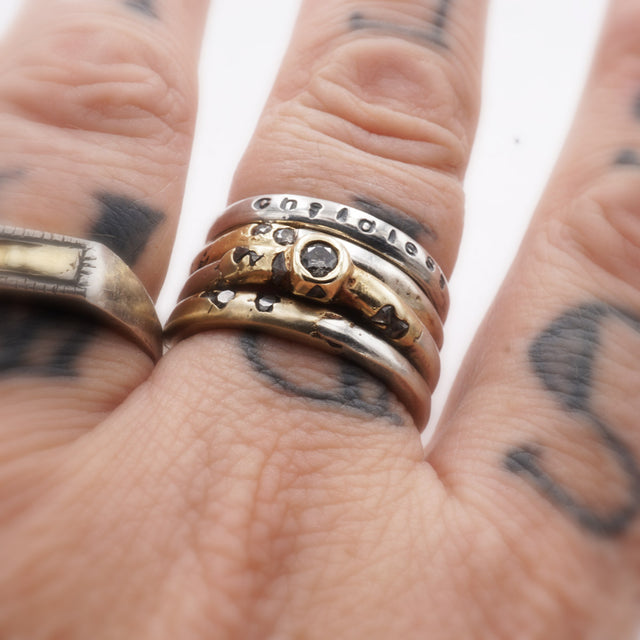 Childless Cat Lady Stamped Sterling Silver Stacking Ring_Shown on hand with other rings