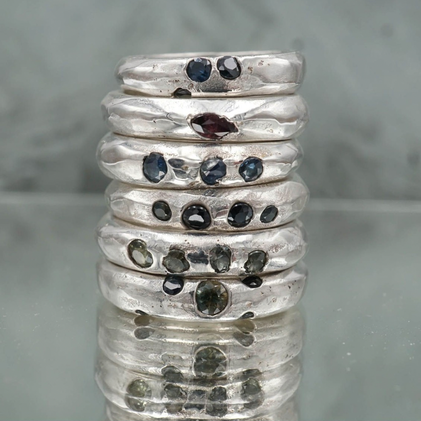Gem stone stacking rings with a wabi-sabi aesthetic look amazing as a single or stack! These rings are created by pouring molten silver into a sand mould with either 3 sapphires, rubies or salt and pepper diamonds. 