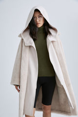 The generous huge boxer hood of the Glacier Faux Shearling coat by Mute by JL will have you reaching for it whenever the temperature plummets. 