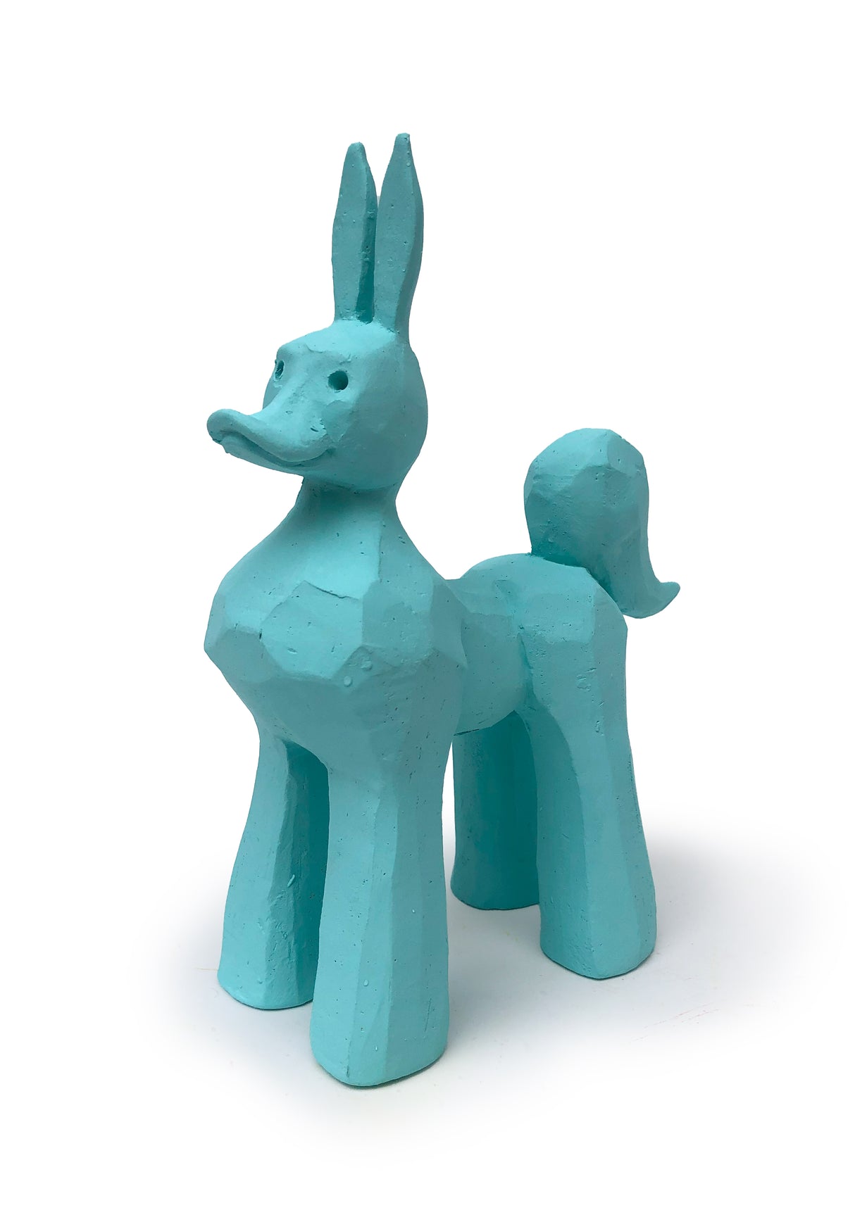 Open is Austyn's turquoise ceramic duck pony sculpture.