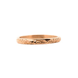 Skinny textured 14K yellow gold ring has a fern leaf detail. Made by Siri Hansdotter for stacking or worn individually